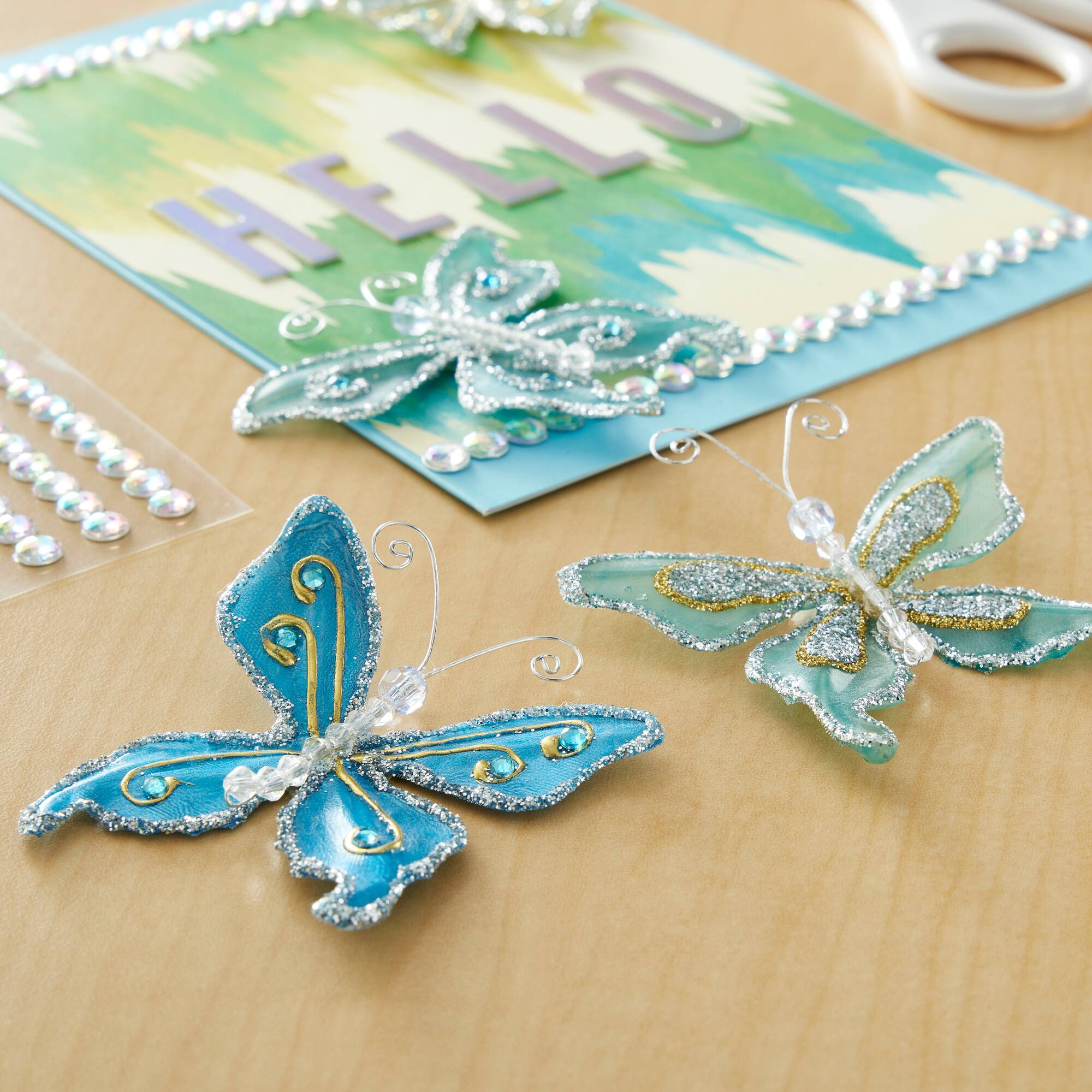 12 Packs: 4 ct. (48 total) Glacee Butterfly Embellishments by Recollections